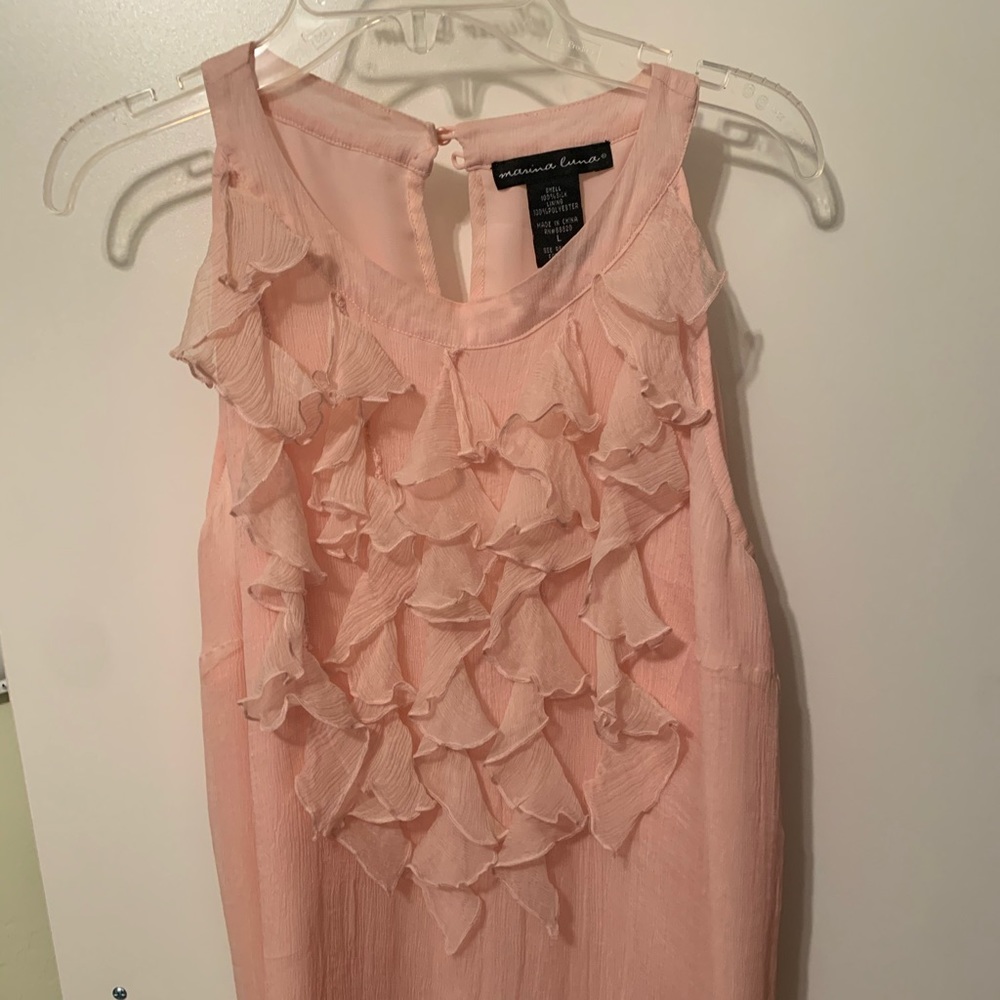 Pink ruffled blouse